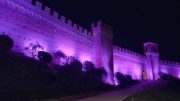 Il Castello di Gradara illuminato in rosa